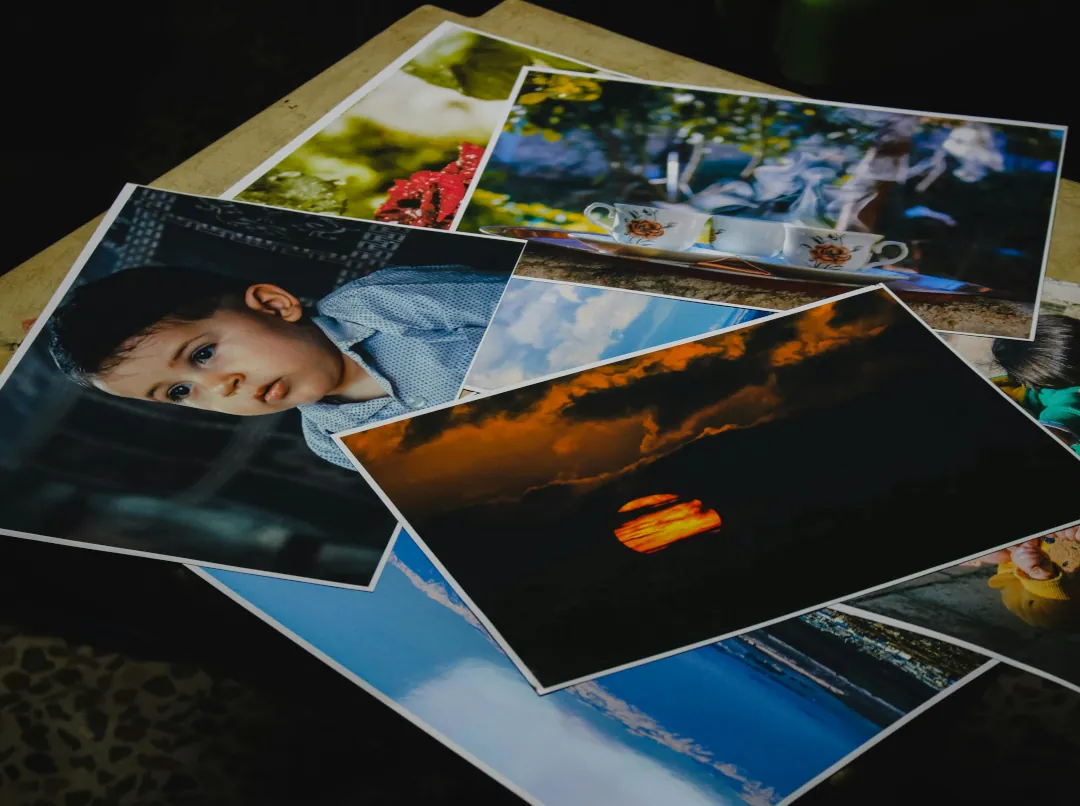 a few pictures sitting on a small table